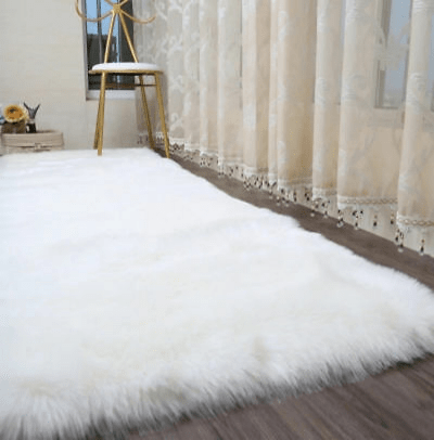 image of white faux fur rug