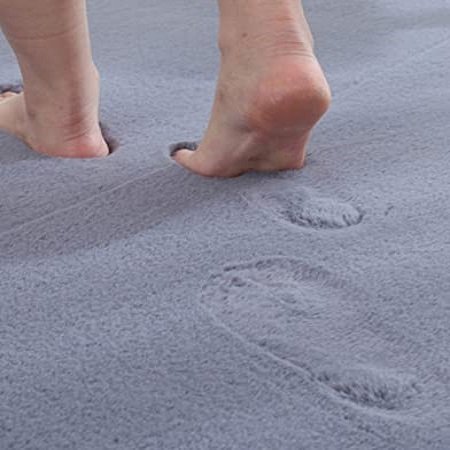gray rabbit fur carpet