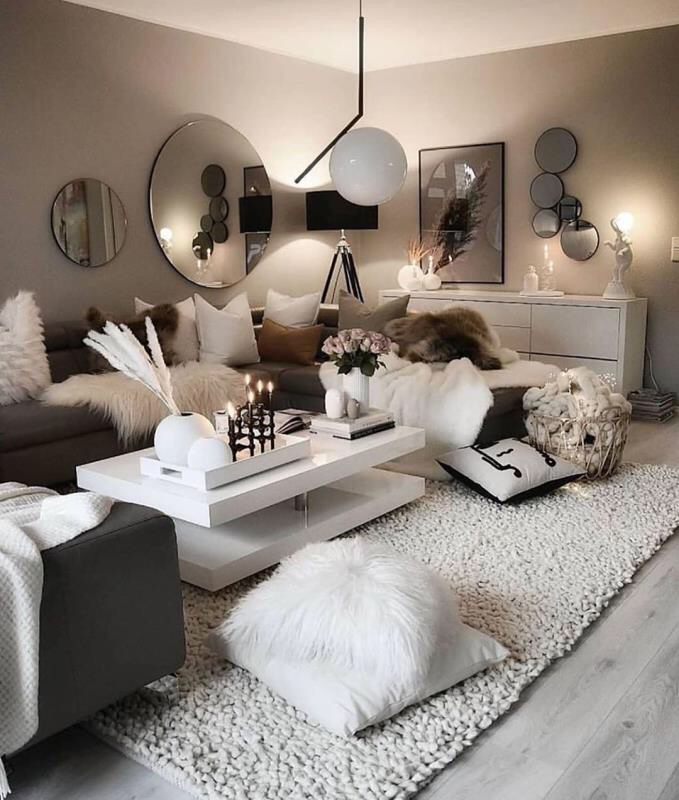 Modern living room styled with faux fur rug and cushions for B2B buyers