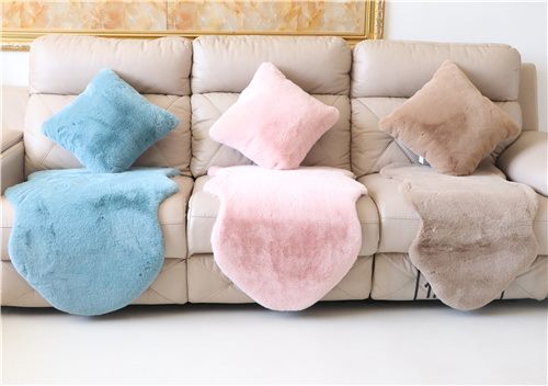 Pastel faux fur cushions and seat throws displayed for custom decor sourcing