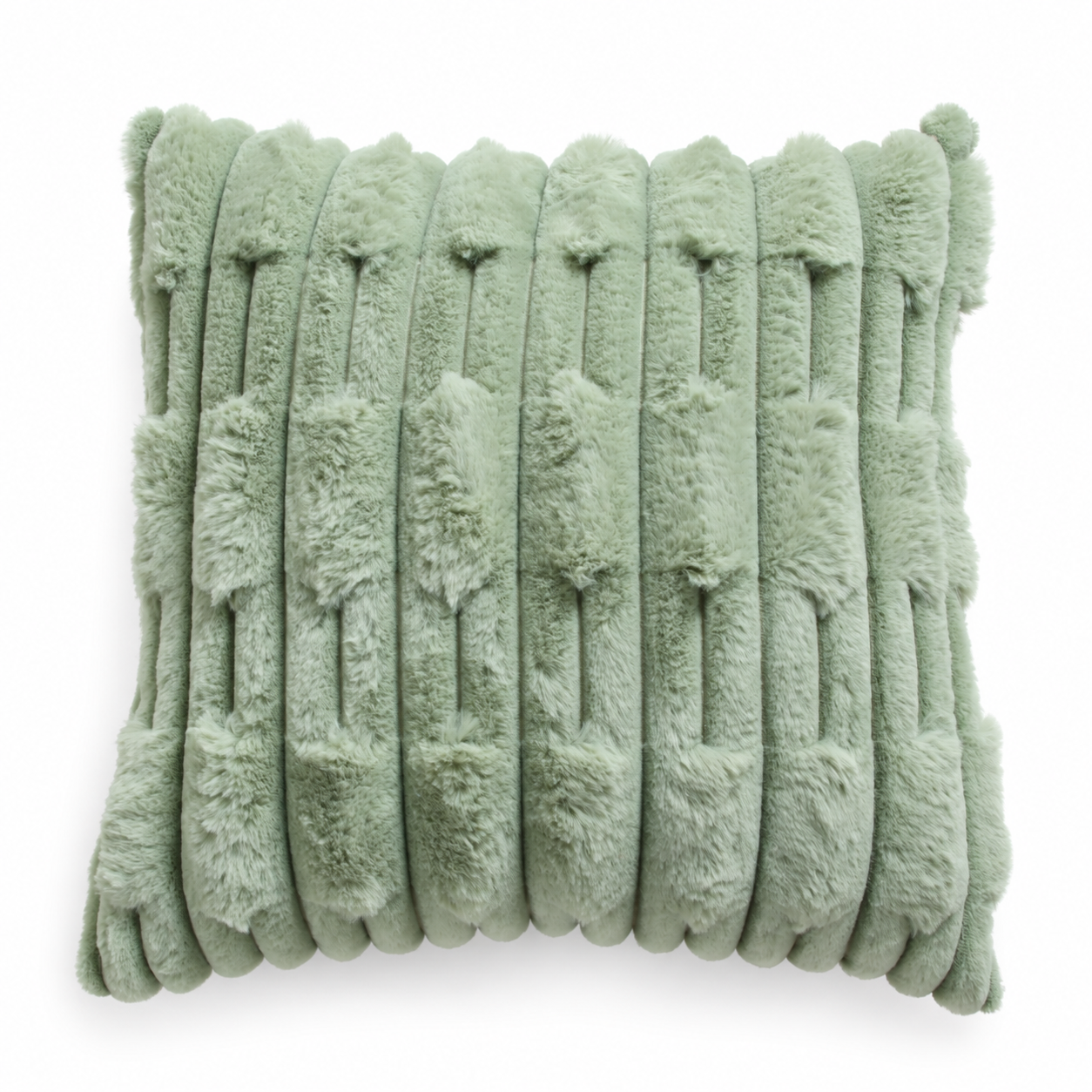 Close-up of a green faux fur cushion with raised geometric stripes