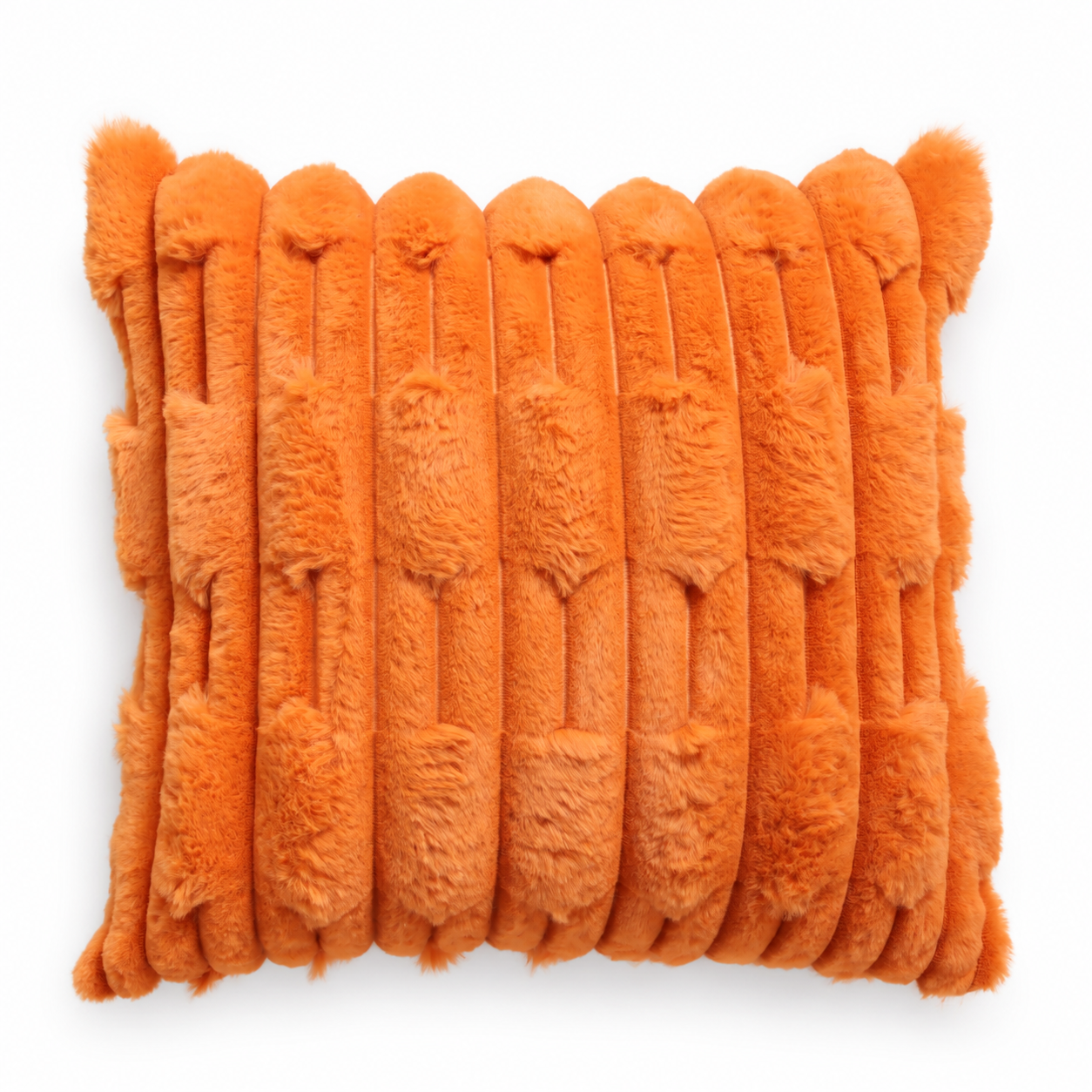 Close-up of a orange faux fur cushion with raised geometric stripes