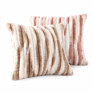 Brown and pink shaded striped faux fur cushions displayed together